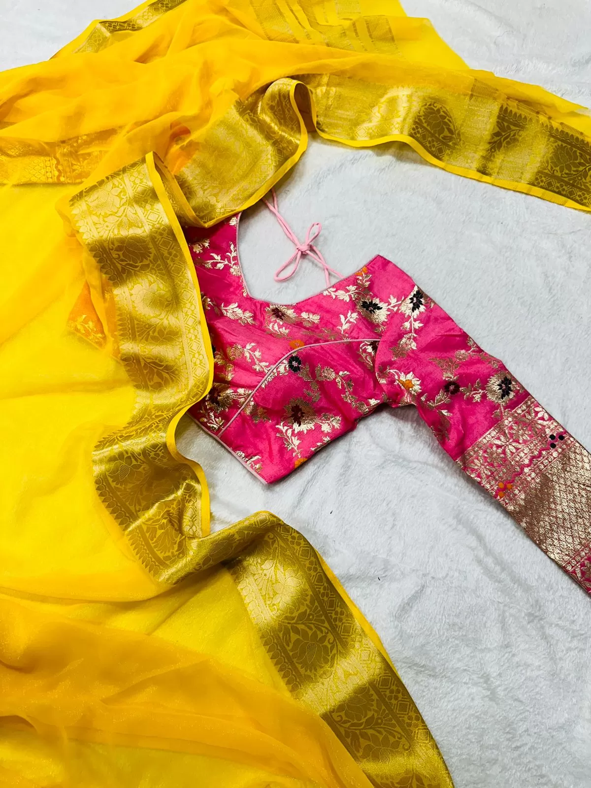 Yellow Chiffon Sari with Pink Stitched Blouse